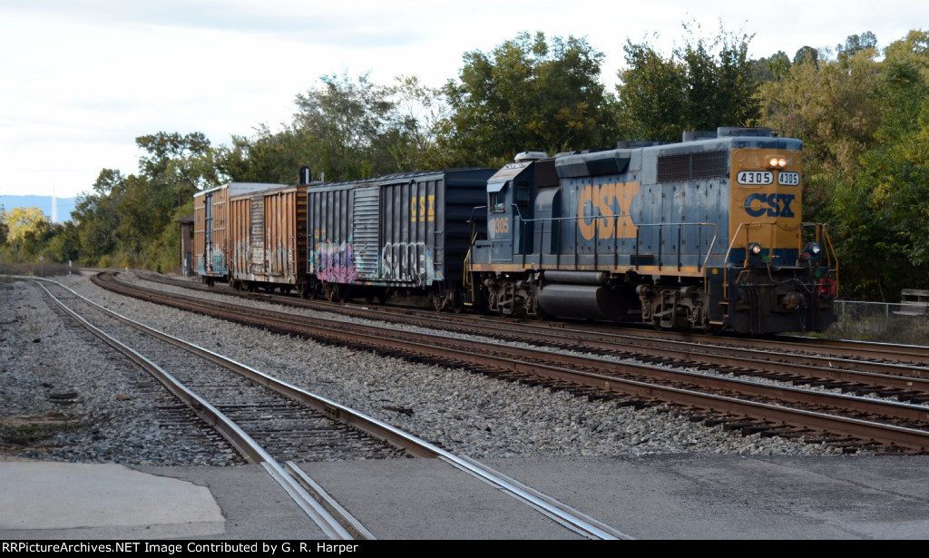 A short local, L206, approaches Washington Street.